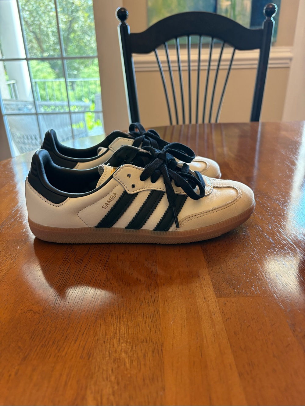 Adidas Women’s Samba sneakers. Tan with black stripes and laces. Sz. 5 1/2.